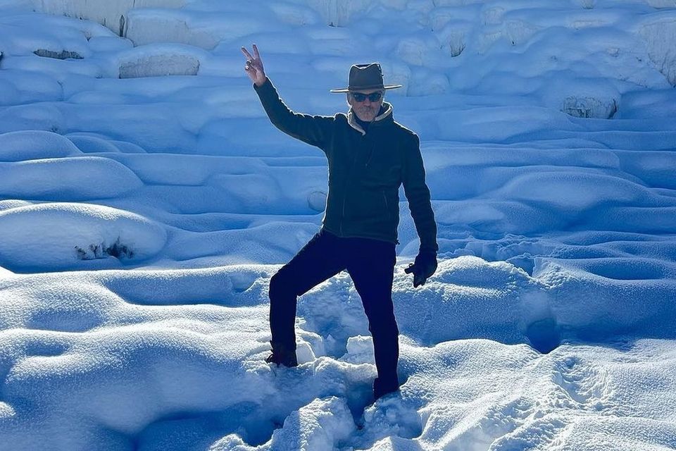 Pierce Brosnan at Mammoth Hot Springs in Yellowstone National Park. Photo: touronsofyellowstone/Instagram