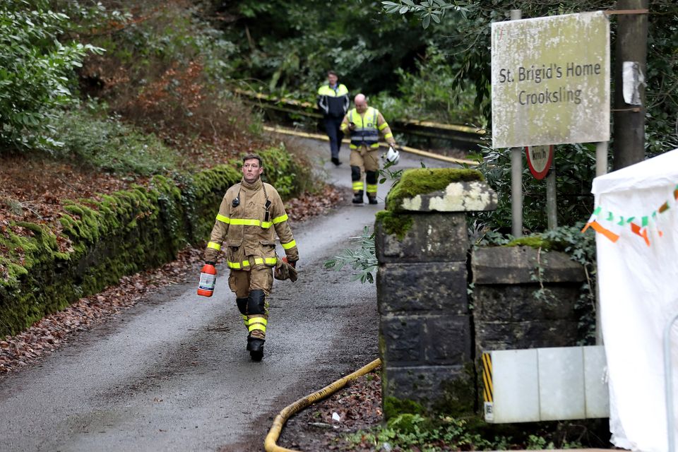 Firefighters at the entrance to the former St Brigid's nursing home in Crooksling, where they battled a major blaze. Photo: Frank McGrath