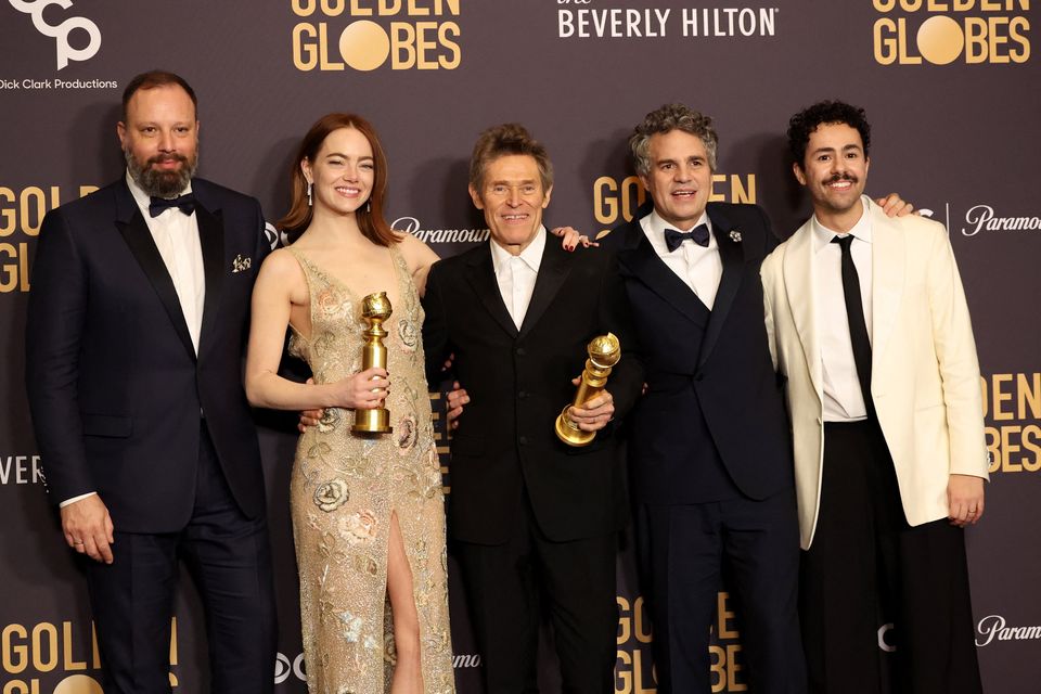 Yorgos Lanthimos, Emma Stone, Willem Dafoe, Mark Ruffalo and Ramy Youssef pose with the award for Best Motion Picture - Musical or Comedy award for "Poor Things", and Best Performance by a Female Actor in a Motion Picture - Musical or Comedy for "Poor Things", at the 81st Annual Golden Globe Awards in Beverly Hills, California, U.S., January 7, 2024. REUTERS/Mario Anzuoni