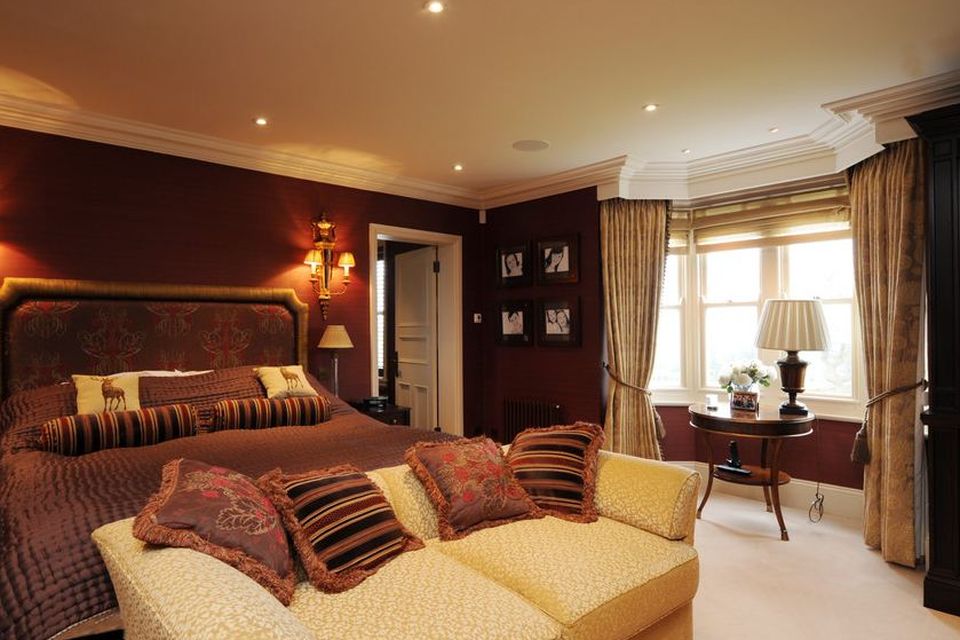 The master bedroom with panoramic views of the River Deben through
the bay window.