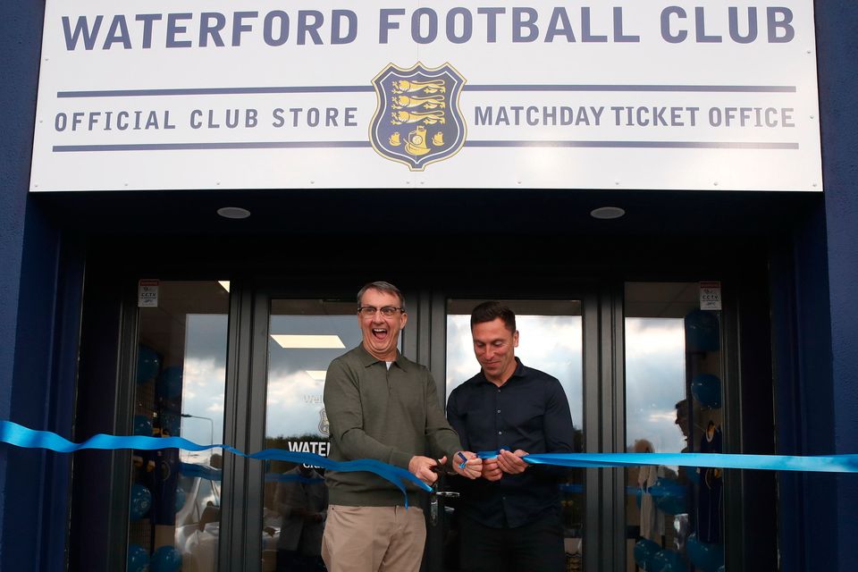 Andy Pilley (L) with ex-Fleetwood Town head coach Scott Brown at the opening of the Waterford FC official club store last May and, right, Blues boss Keith Long