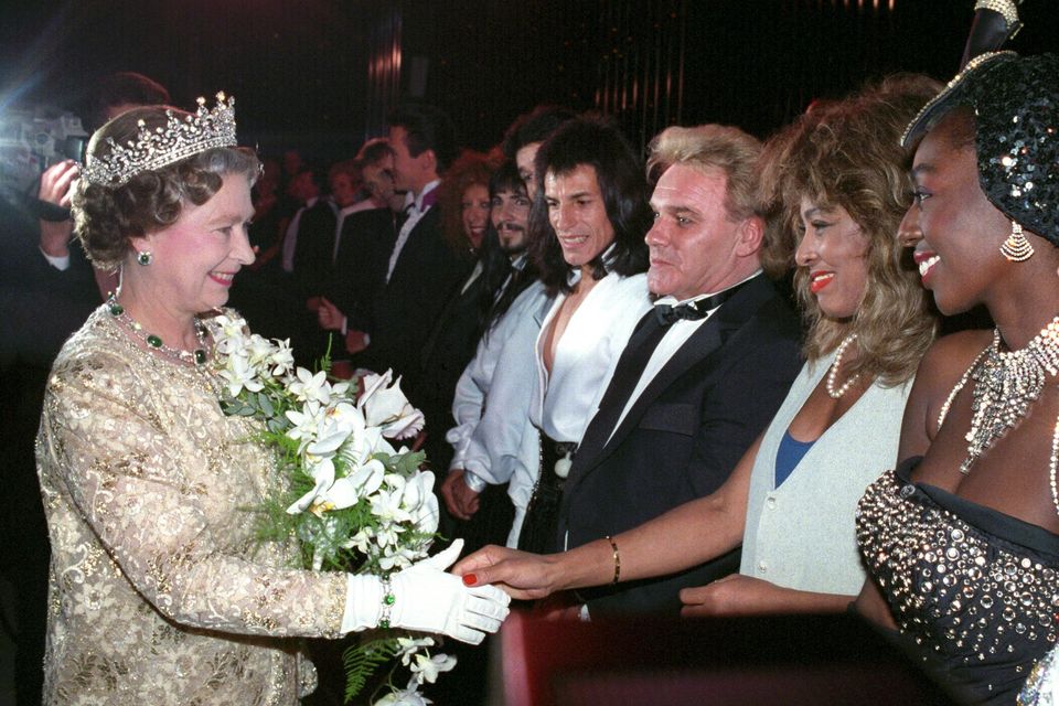 The late Queen Elizabeth II meeting Tina Turner, watched by the comedian Freddie Starr, following a Royal Variety Performance at the London Palladium in 1989 (PA)