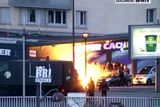 thumbnail: A still image form video shows an explosion lighting the front of a kosher supermarket as French police special forces launch their assault, where several people were taken hostage near the Porte de Vincennes in eastern Paris January 9, 2015. Two brothers suspected of a bloody attack on the offices of French satirical newspaper Charlie Hebdo were killed when police stormed their hideout northeast of Paris on Friday, while a second siege at the supermarket ended with the deaths of four hostages