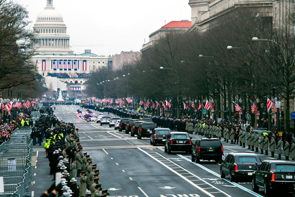 The Presidential motorcade drives on Pennsylvania Avenue to the Capitol for the Inauguration of President-elect Donald Trump, Friday, Jan. 20, 2017, in Washington. (AP Photo/Cliff Owen)