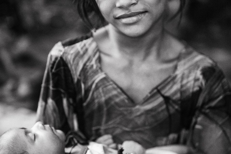 A girl and her baby sister, living on the streets of Kolkata, India. Photo: Arthur Carron
