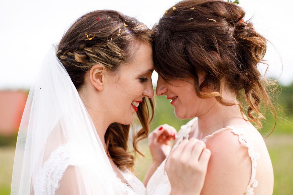 Love shines through for Aisling and Trish at their summer solstice wedding  party | Irish Independent