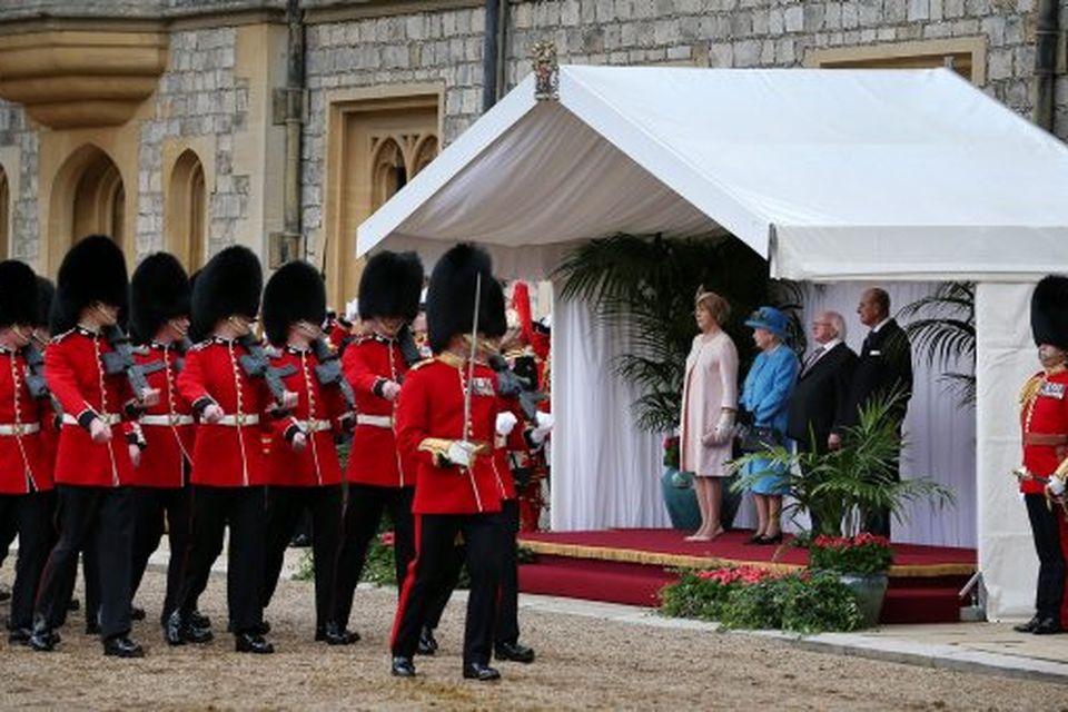 From left;  Sabina Higgins, Queen Elizabeth, President Higgins and Prince Philip watch a ceremonial welcome at Windsor Castle