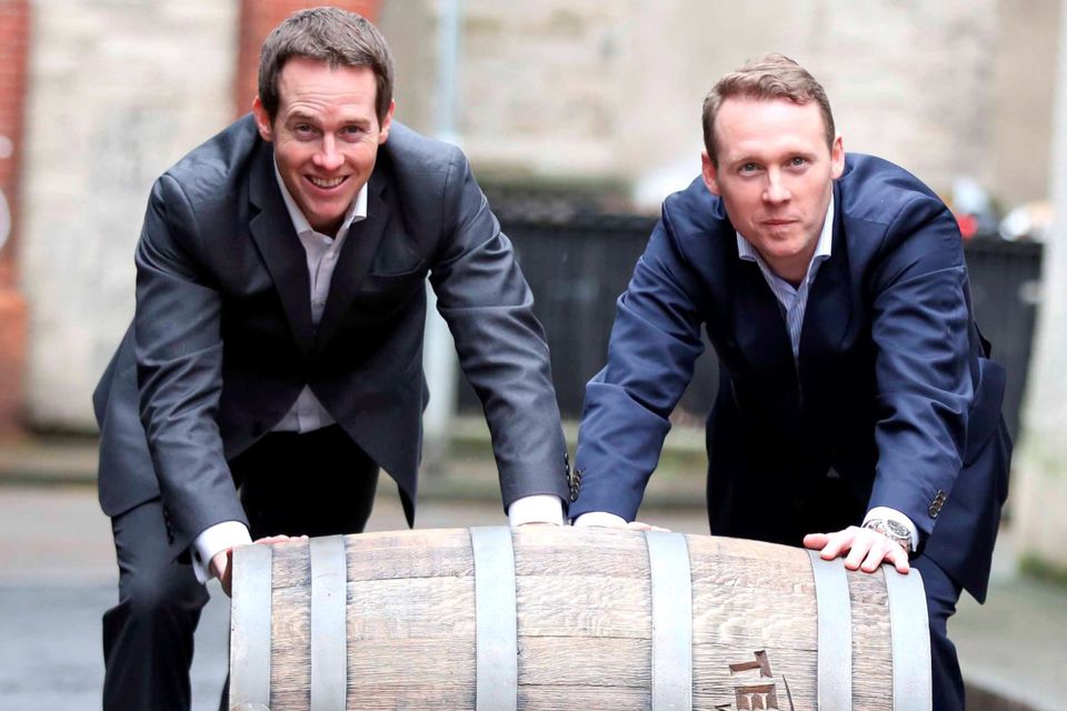 Jack Teeling, right, with brother Stephen outside the Teeling Whiskey distillery in Dublin, which was the city’s first in more than 125 years