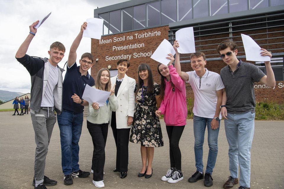 Education Minister Norma Foley and Kerry Harkin, principal of Presentation Secondary School Milltown in Killarney, Co Kerry, congratulate pupils Cadgh Evans, Sean Flynn, Justyna Przyborska, Hannah Joy, Cian Spillane and Marcus Labery after they received their results yesterday. Photo: Domnick Walsh