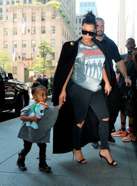 Kim Kardashian and North West are seen outside the Trump Hotel on September 7, 2015 in New York City.  (Photo by Raymond Hall/GC Images)