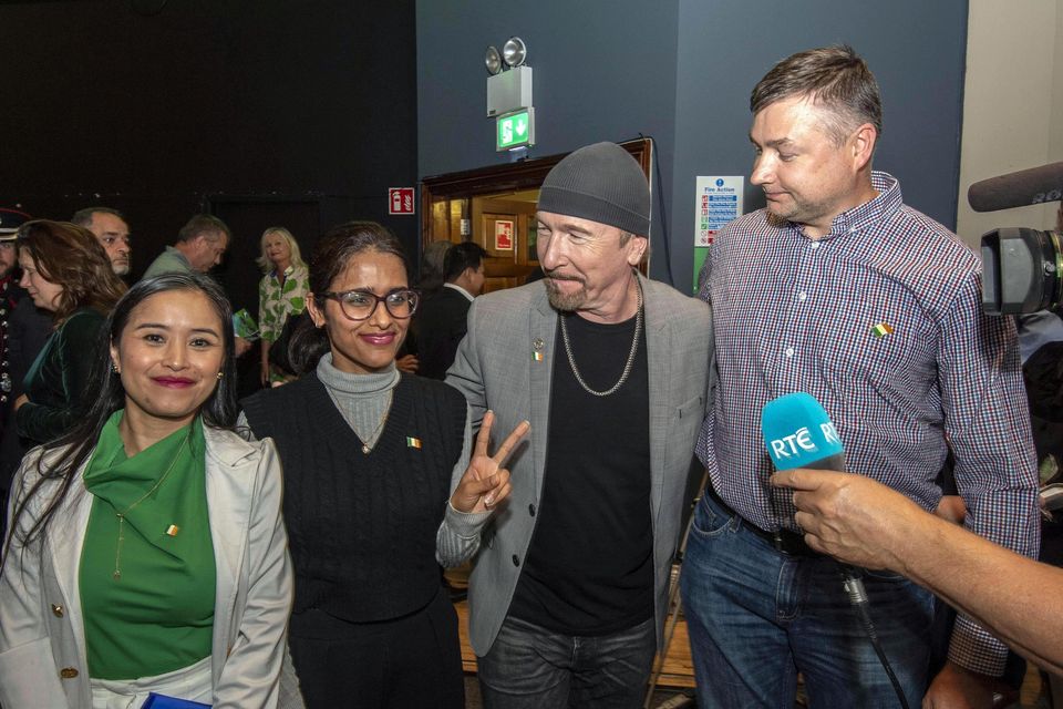 The Edge (David Howell-Evans) pictured with fellow citizens after they received Irish Citizenship at Gleneagle Killarney on Monday. Photo: Don MacMonagle