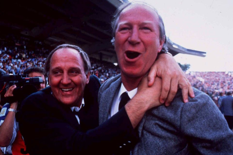 Ireland manager Jack Charlton, right, and assistant manager Maurice Setters celebrate their team's Euro 88 victory over England at the Neckarstadion, Stuttgart, Germany. Photo by Ray McManus/Sportsfile