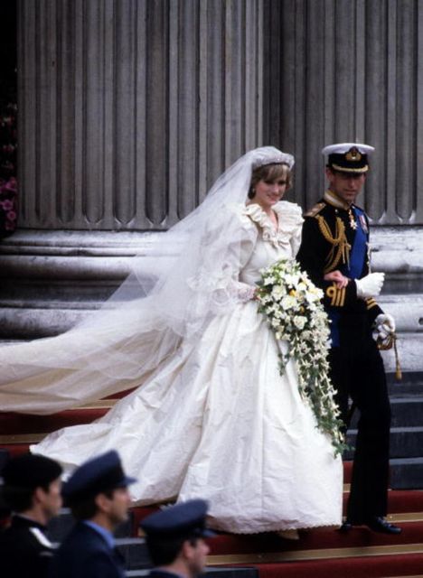 Diana, Princess of Wales, wearing an Emanuel wedding dress, leaves St. Paul's Cathedral with Prince Charles, Prince of Wales following their wedding on 29 July, 1981 in London, England. (Photo by Anwar Hussein/Getty Images)