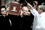 thumbnail: Bono and his brother Norman carry their father Bob's coffin