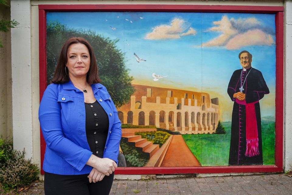 Artist Mary Leen at the mural that was vandalised. Photo Mark O'Sullivan.