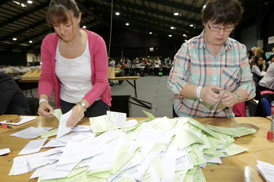 Count Staff sort out the ballot papers in both the Marriage Equality Referendum and the  Presidential Age Referendum  in the RDS Simmonscourt .
Pic Frank Mc Grath