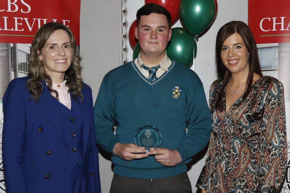 Charleville CBS student Charlie Duignan with the Paddy Ryan Award for English and Literature pictured with Andrea Murphy, Principal (left) and teacher Niamh O'Sullivan.