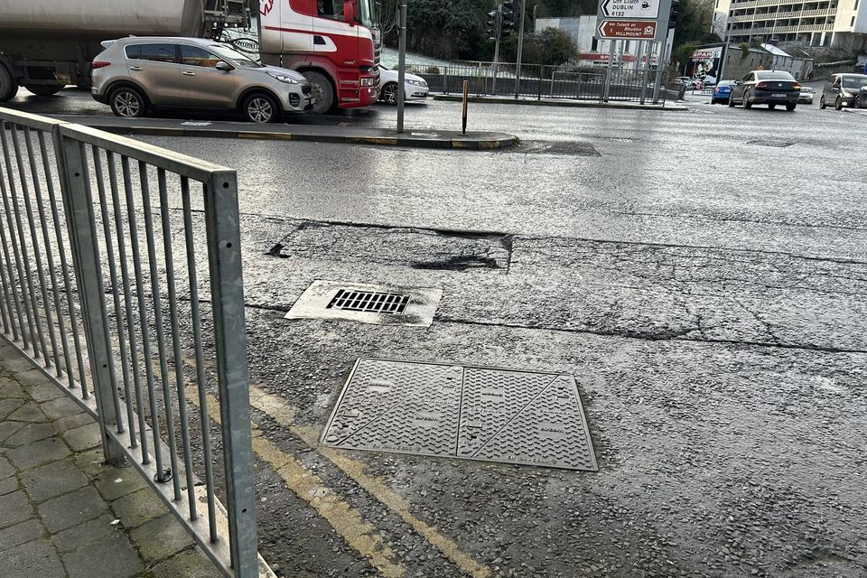 The town centre, like the junction at John Street, doesn't get preferential treatment when it comes to potholes.