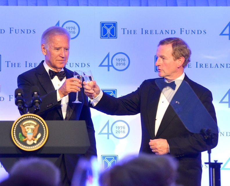 US Vice President Joe Biden and Taoiseach Enda Kenny raise a toast as they attend the Ireland Fund’s 40th Anniversary Gala Dinner at Trinity College in Dublin, Ireland Credit: Barbara Lindberg.