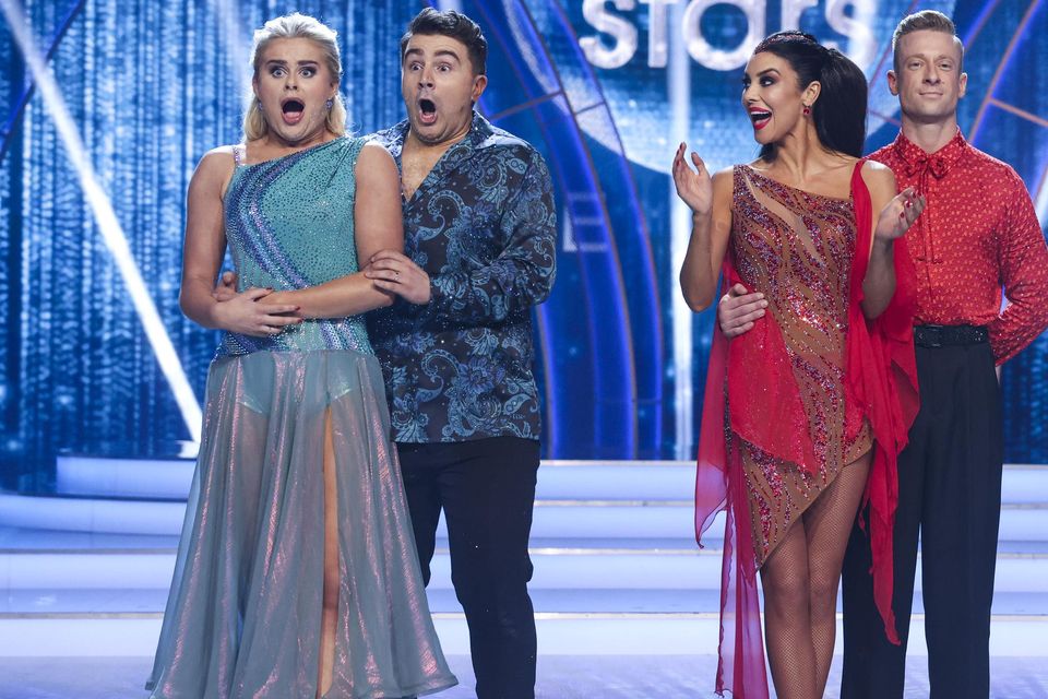 Broadcaster Carl Mullan with pro-dance partner Emily Barker (both in blue) during last night's Dancing With The Stars after they were announced as winners. On the right is influencer Suzanne Jackson with pro-partner Michael Danilczuk