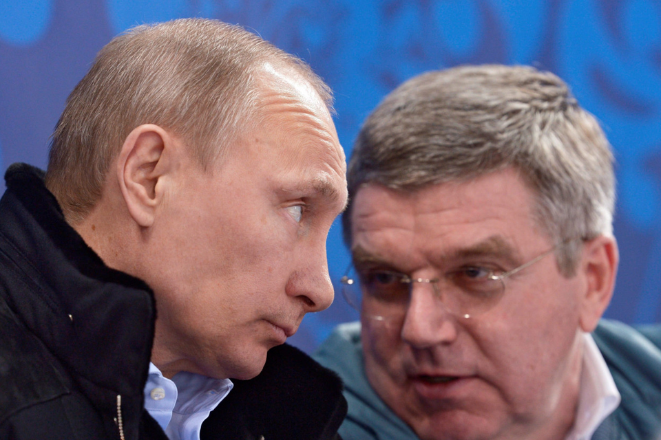 Vladimir Putin, left, with IOC boss Thomas Bach in 2014