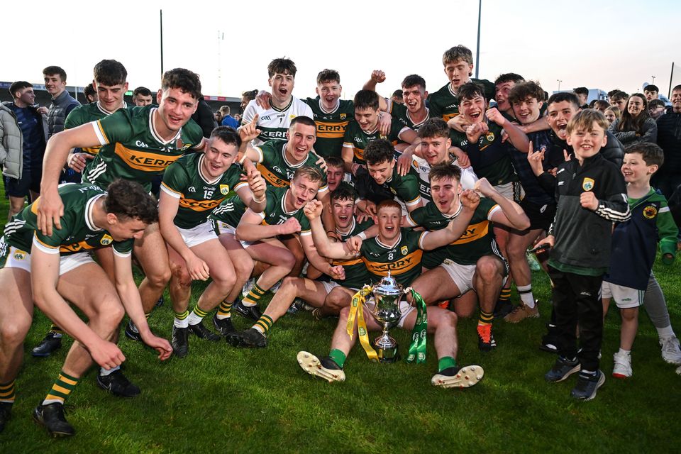 Kerry players celebrate with the cup after beating Cork. Photo by Brendan Moran/Sportsfile