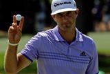 thumbnail: Dustin Johnson waves after a birdie on the second green during the third round of the Masters golf tournament