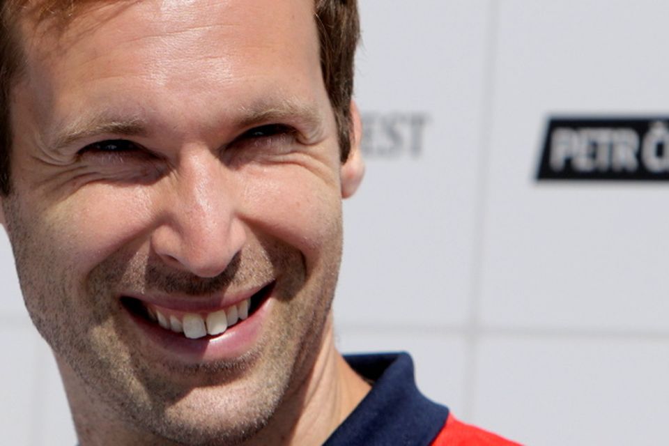 Czech soccer player Petr Cech smiles during a news conference in Prague