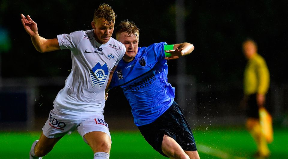 Luka Lovic of UCD in action against Henrik Jenset of Molde FK. Photo by Matt Browne/Sportsfile