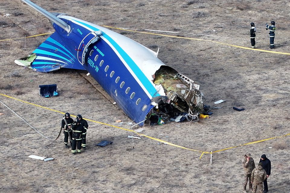 Emergency specialists working at the crash site of the Azerbaijan Airlines passenger plane near the city of Aktau, Kazakhstan Photo: Reuters