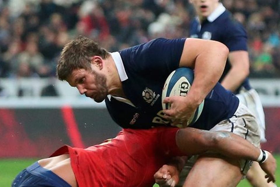 Ross Ford of Scotland is tackled during the RBS Six Nations match between France and Scotland at Stade de France on February 7, 2015 in Paris