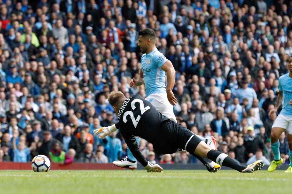Sergio Aguero opens the scoring for Manchester City against Liverpool