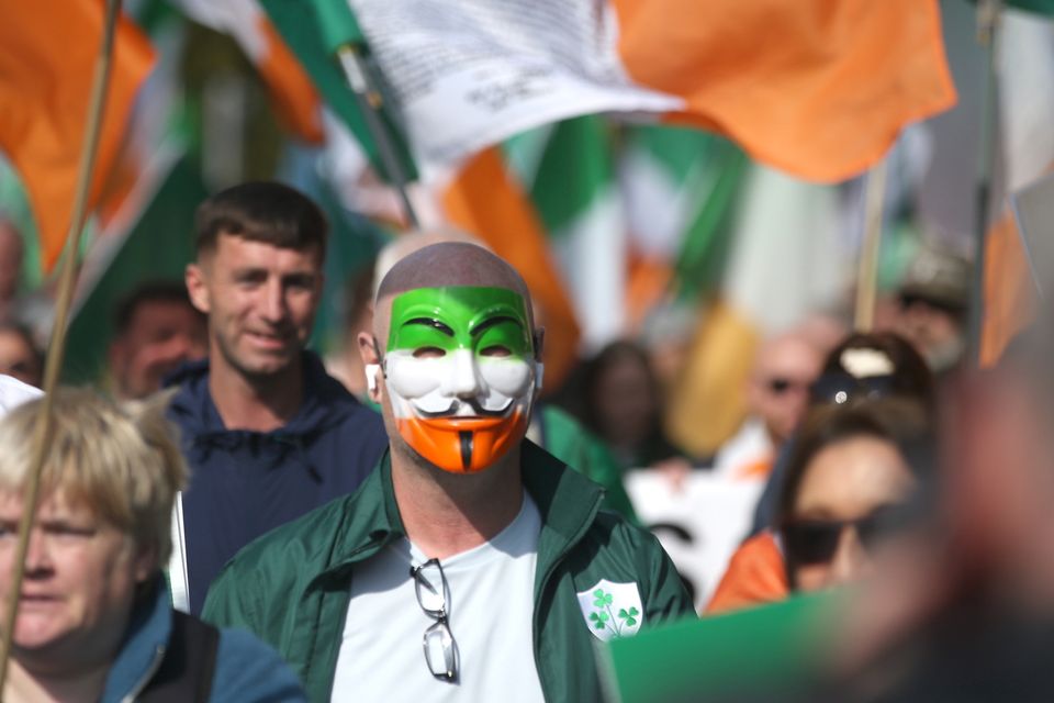 Garda Public order units deployed as hundreds of anti-immigration protesters march to Dáil