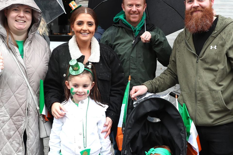 The Rooneys waiting for the parade to start.
