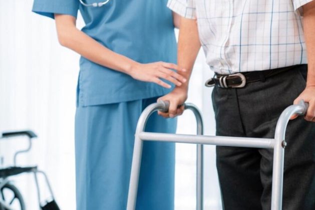 Nursing home resident left in physical discomfort while another left waiting to use toilet due to lack of staff