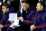 thumbnail: Manchester United manager Louis van Gaal checks his notes during last night’s victory at the iPro Stadium Photo: Reuters