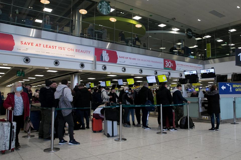 People queuing at Dublin Airport. Photo: Gareth Chaney/Collins Photos.