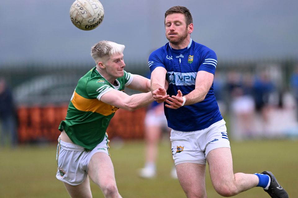 Sean O'Mahonys' Oisín Breen and Robbie Leavy of Ardee St Mary's during Friday night's Division 1 clash in Dundalk. Picture: Ken Finegan/Newspics