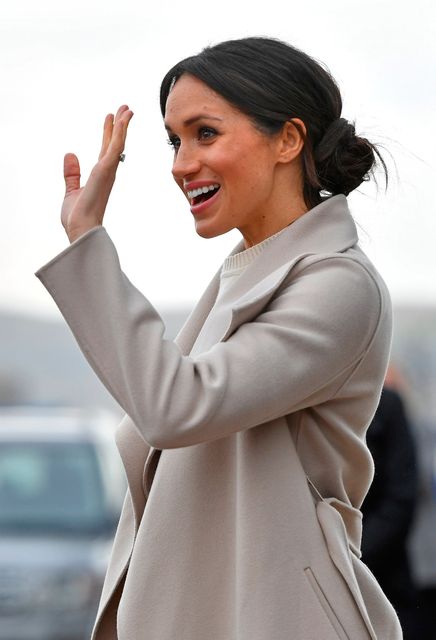 Meghan Markle leaves after a visit to Titanic Belfast maritime museum in Belfast, Northern Ireland March 23, 2018. Joe Giddens/Pool via REUTERS