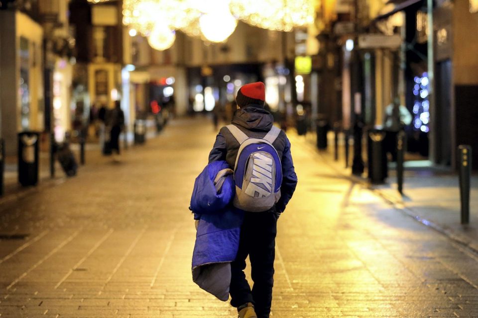 A homeless man makes his way up Dublin's Grafton Street in the early hours, looking for a place to bed down for the night.
5/12/14
Pic Frank Mc Grath