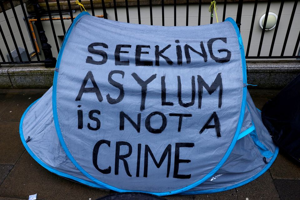 A tent belonging to an asylum-seeker outside the International Protection Office (IPO) in Dublin, where hundreds of migrants in search of accommodation had been camping on the pavement for several months. Photo: Reuters