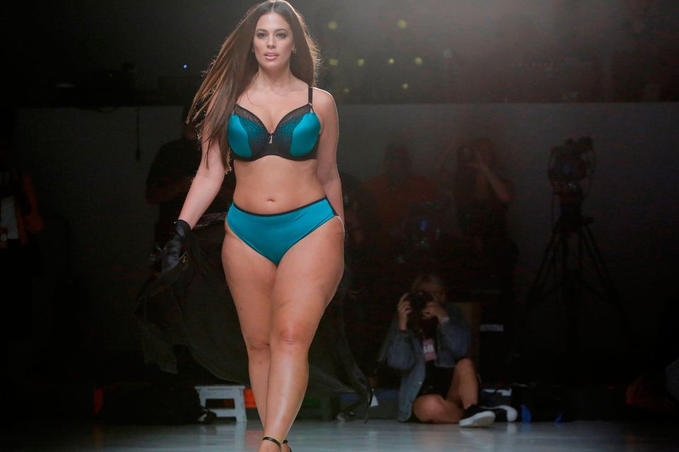 Star model Ashley Graham celebrates curves on NY runway