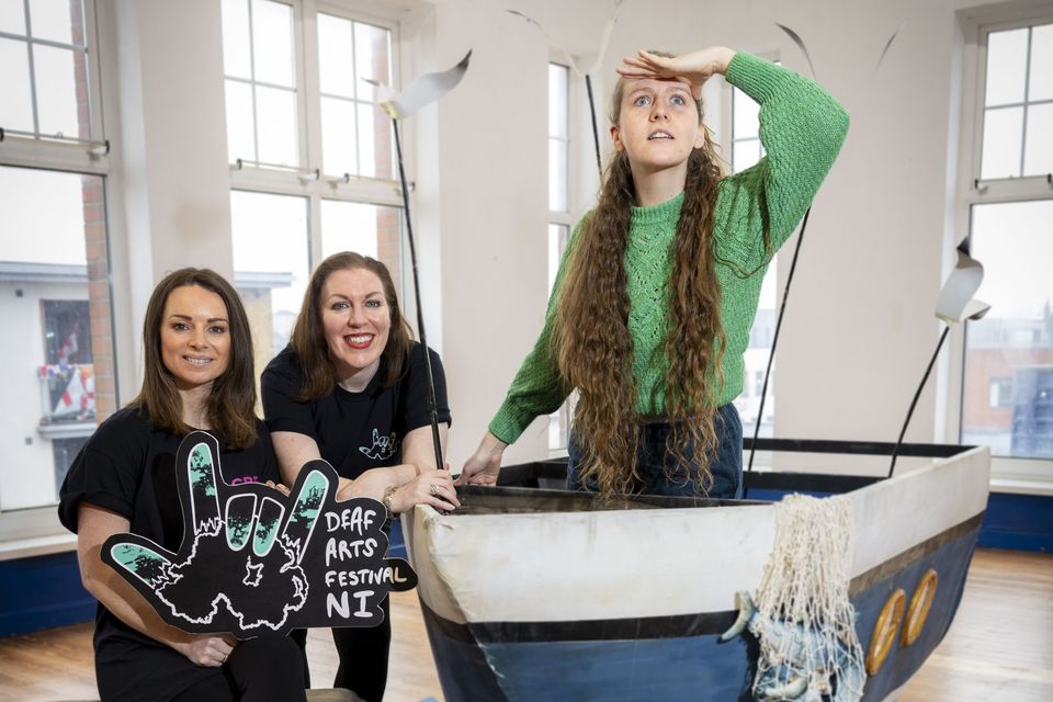 Sarah Lyle from Cre8 Theatre and Paula Clarke, artist, activist and performer, are pictured with Zoë McWhinney, The Fisherman’s Friend (Arts Council NI/PA)