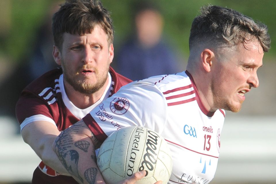 O'Connells' Andrew Sharkey and Gary Keogh of Oliver Plunkett's during their Division 3A encounter in Castlebellingham. Picture: Aidan Dullaghan