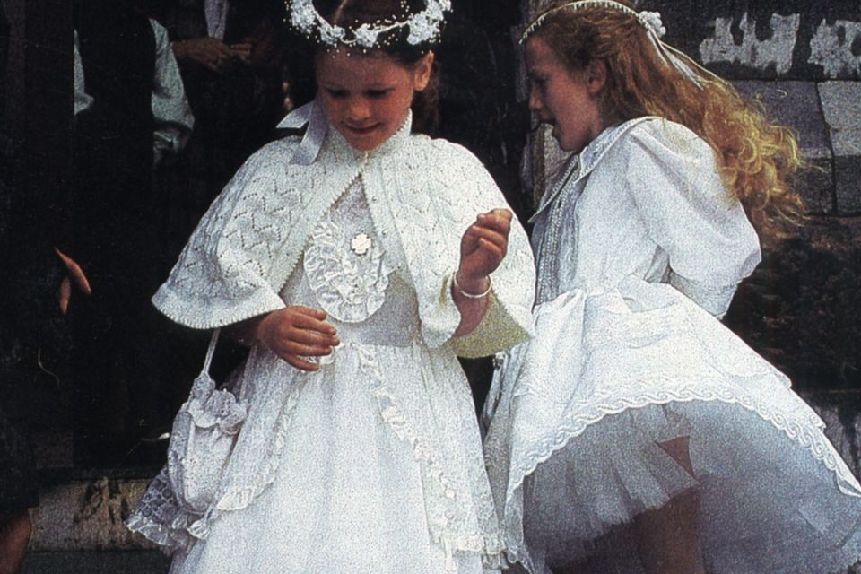 Angela Ryan and her friend Michelle on their Communion Day in Dingle, Co Kerry. Angela is now married with a child and still lives in Dingle