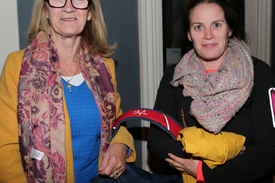Newmarket Sacristan Kathleen Enright pictured here with Mairead Enright
as they arrived home in Newmarket at 12.30am after their day in the
Phoenix Park. Kathleen was complimented by everyone for her excellent co-ordination of the trip
