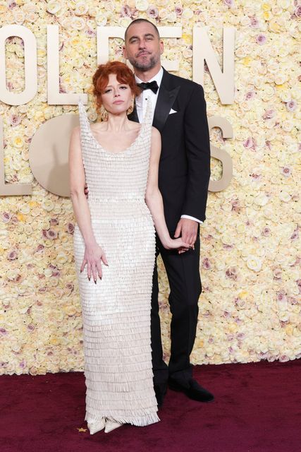 Natasha Lyonne, left, and Bryn Mooser arrive at the 81st Golden Globe Awards on Sunday, Jan. 7, 2024, at the Beverly Hilton in Beverly Hills, Calif. (Photo by Jordan Strauss/Invision/AP)