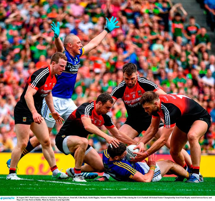 Paul Geaney of Kerry is tackled by Mayo players, from left, Colm Boyle, Keith Higgins, Séamus O'Shea and Aidan O'Shea