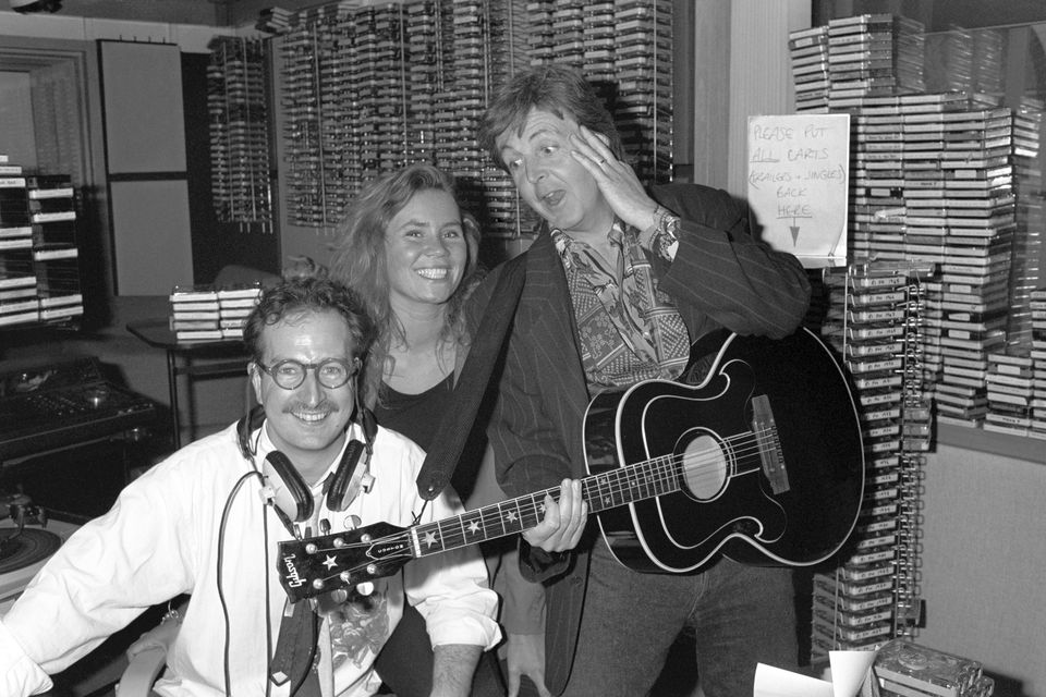 Paul McCartney surprising Steve Wright and his production assistant Dianne Oxberry back in 1990 (PA)