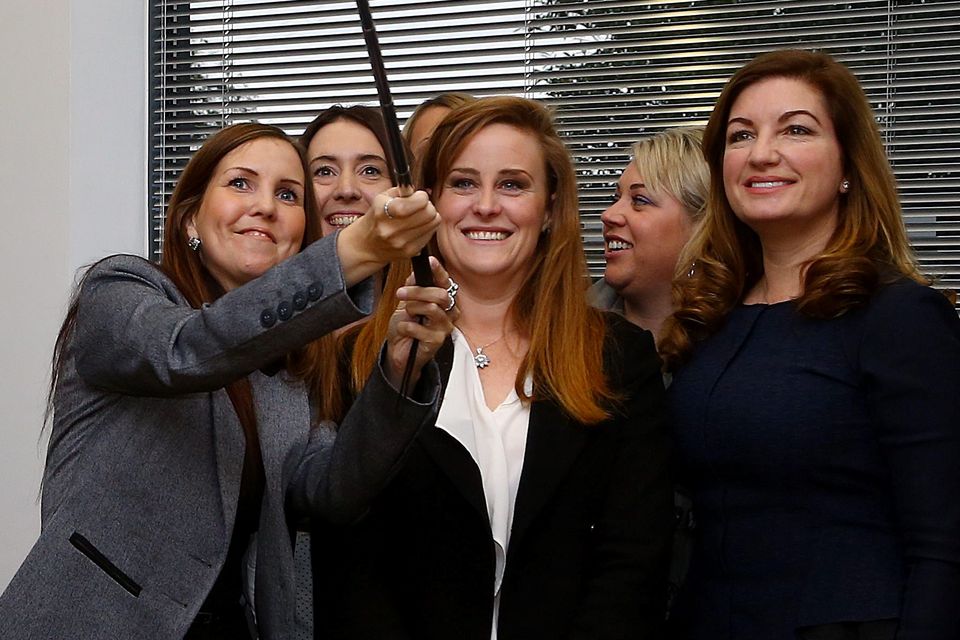 Kelly Tolhurst, Conservative Candidate for Rochester and Strood (middle) and Karren Brady (right), Small Business Ambassador to the UK Government, pose for a selfie with local business women following a Start-Up Business Roundtable at Innovation Centre Medway near Rochester, Kent.